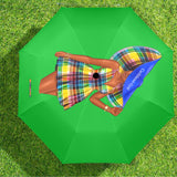 Woman holding Virgin Islands Gyal umbrella with tropical-inspired design
