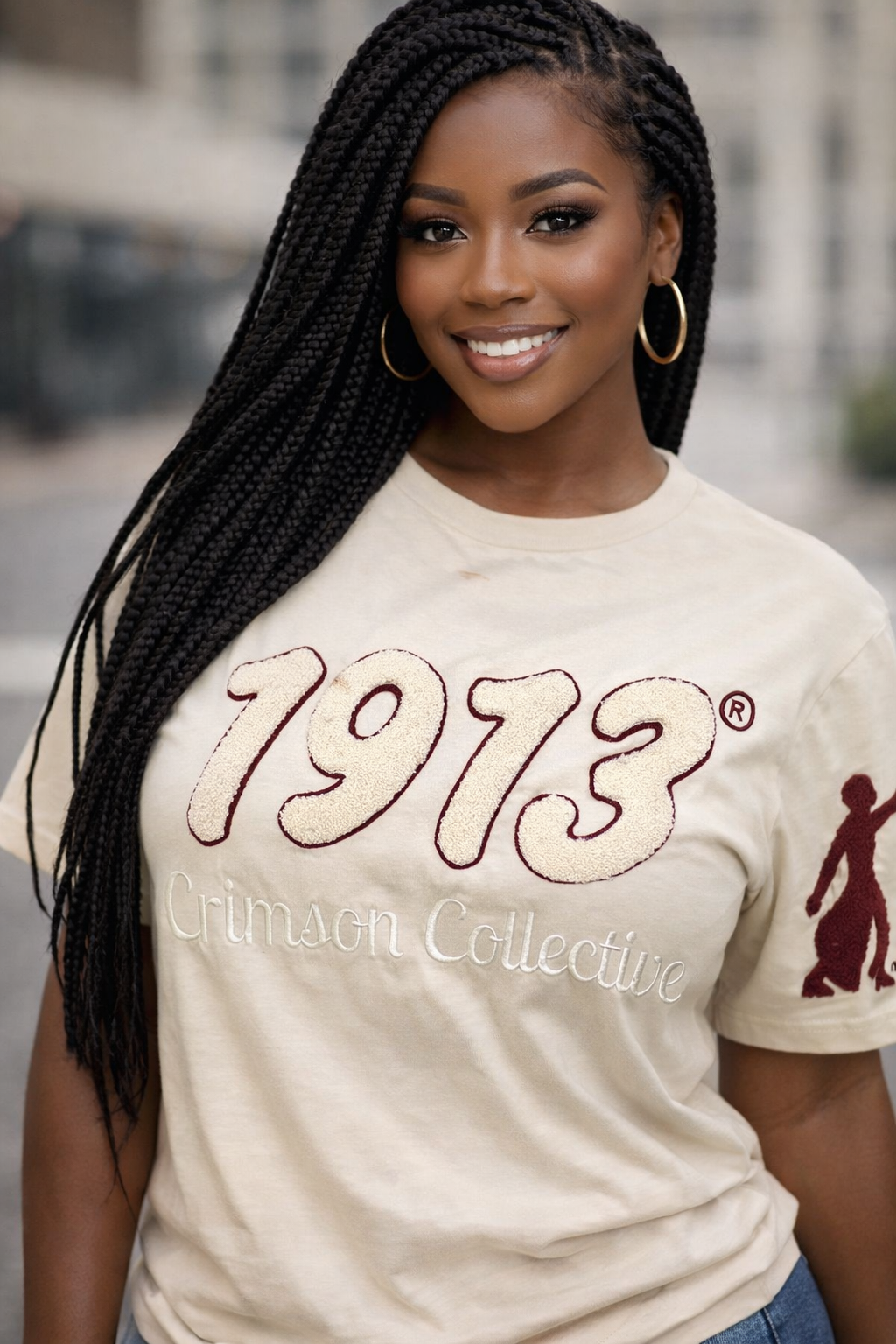 Woman wearing Crimson Collective 1913 premium embroidered t-shirt styled casually