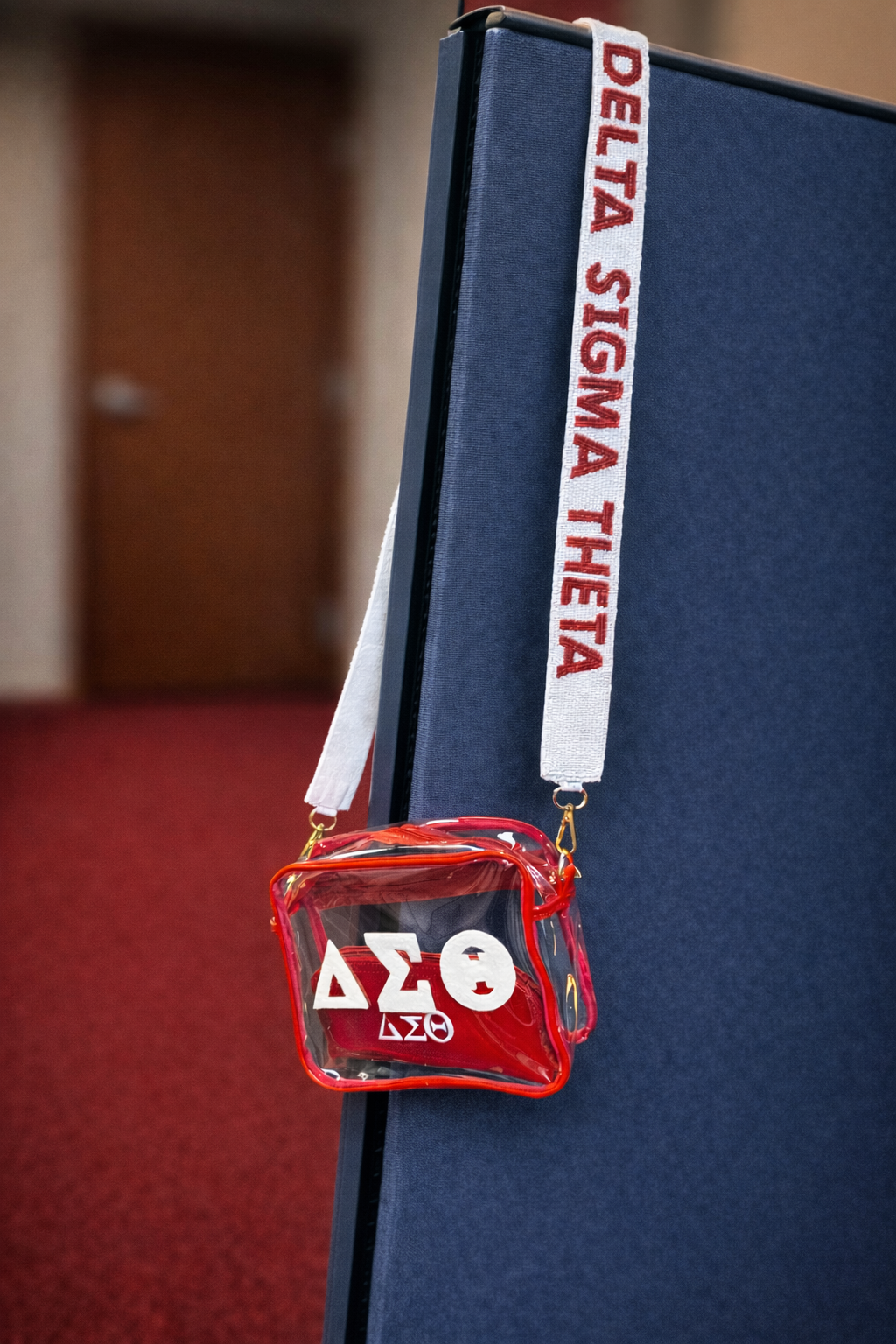 Close-up of transparent stadium-approved crossbody bag material and stitching by The Sassy Greek